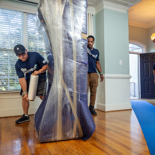 Protecting the sofa with pad wrapping and shrink wrapping
