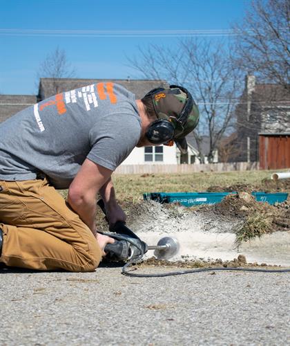 Rannebarger Home Maintenance - Drain Tile Curb Hole Cutting