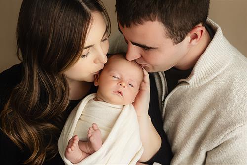Sweet first family photos taken during a Newborn Session.