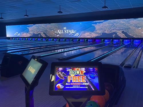 Our main set of 22 bowling lanes with 121 ft LED video wall
