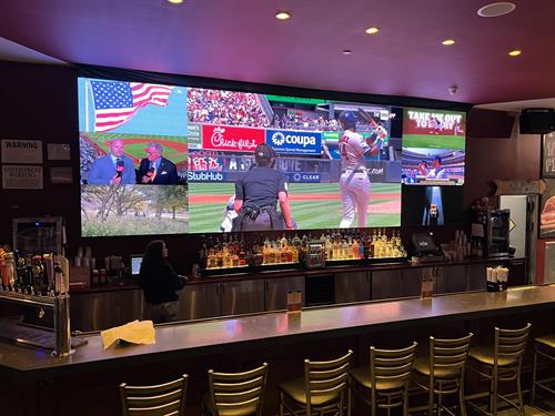 Our restaurant and sports bar that can seat 110 people with a 28 ft LED video wall