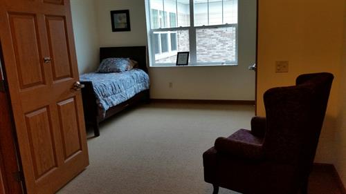 Autumn Lane memory care studio apartment - all have a full bathroom with walk in shower