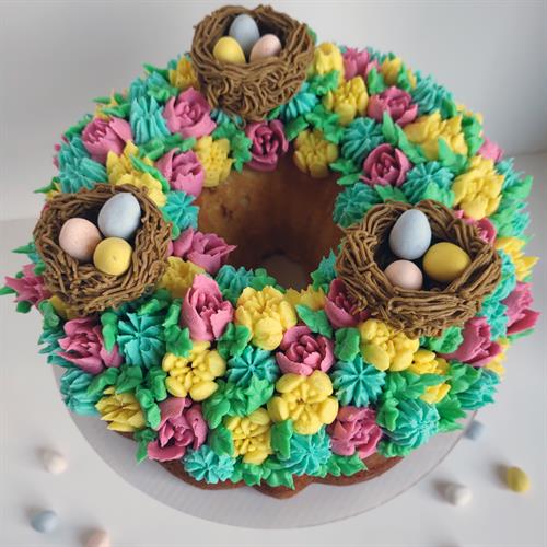 Spring-themed decorated Bundt cake, great for office gatherings