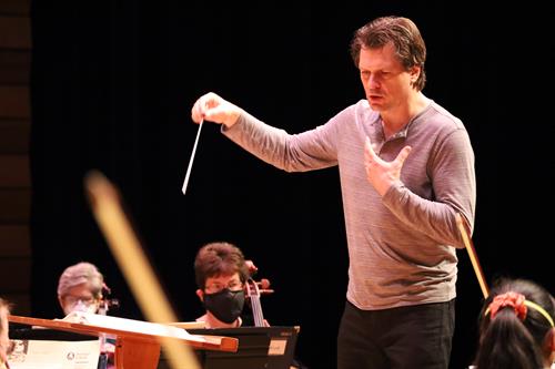 Music Director Martin Majkut conducts rehearsal in Medford