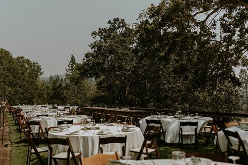 Round tables set on lawn. Round tables set on lawn.