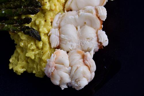 Blossom Barn Dinner | Poached lobster served over creamy saffron risotto. Blossom Barn Dinner | Poached lobster served over creamy saffron risotto.