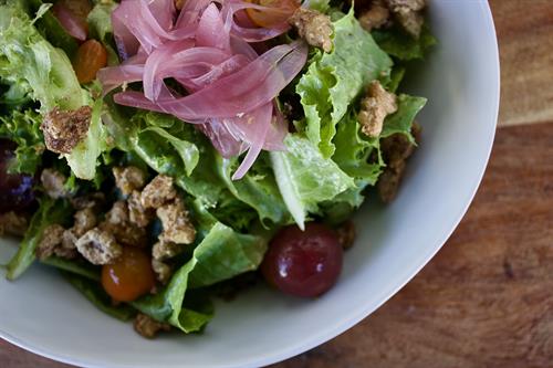 Market Salad | Mixed greens, cherry tomatoes, pickled red onions, candied walnuts, and a plum vinaigrette. |GF|DF| Market Salad | Mixed greens, cherry tomatoes, pickled red onions, candied walnuts, and a plum vinaigrette. |GF|DF|