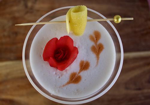 Perfect Plum Sour | Four Roses bourbon, plum purée, sage syrup, simple syrup, egg white, and plum bitters. Perfect Plum Sour | Four Roses bourbon, plum purée, sage syrup, simple syrup, egg white, and plum bitters.