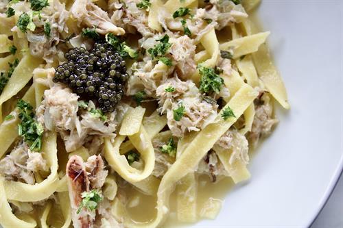 2.7.25 Sweetheat Special: Crab Pasta: Crabs tossed in white wine butter sauce, house fettuccine, lemon gremolata & Osetra caviar.