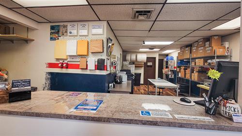 Our Main Station looking into our back room where we sort mail, packages, and pack items. 