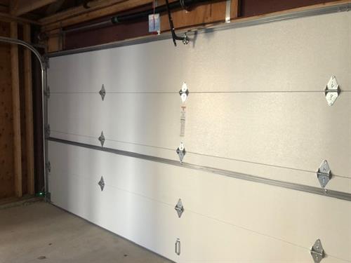 new insulated garage door installation