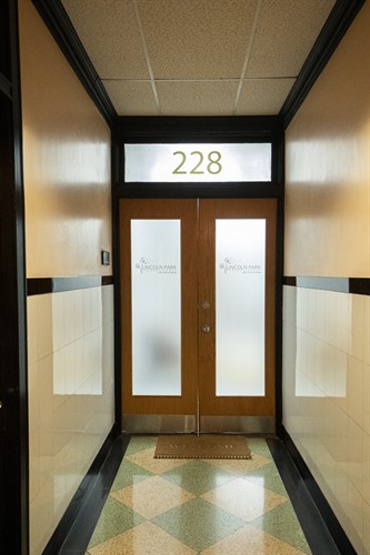 Lakeview therapy office exterior. Inviting entrance at Suite 228 with Lincoln Park Therapy Group branding.