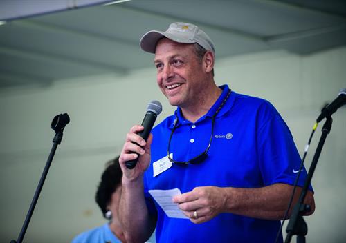 Robert Stelletello, OPRF Rotary Club President, speaking from the main stage at the Rotary Food Truck Rally 08/26/2017