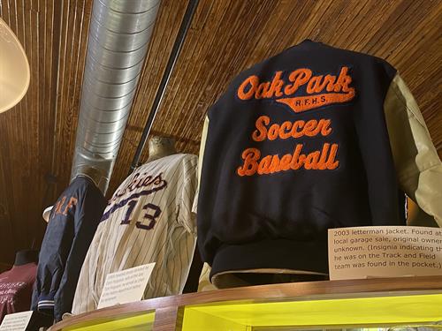 This letterman’s jacket is one of many OPRF artifacts on display in the museum’s exhibit celebrating the 150th year of  Oak Park River Forest High School.