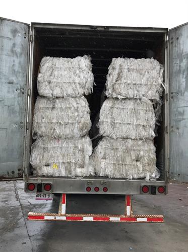 baled white paper on its' way to MX