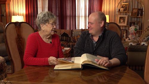 Randy talks with his grandmother about their family stories, which he enjoys doing with other people's families, too.