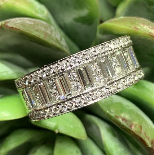 Baguette and round diamond band set in platinum