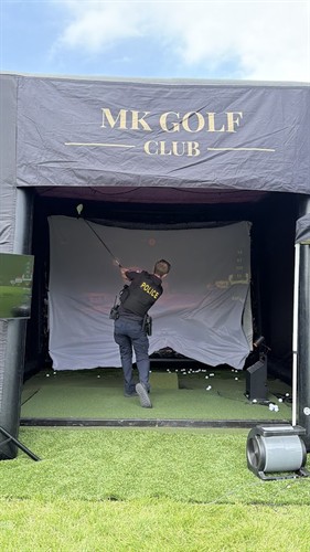 Gallery Image cop_golf.JPG
