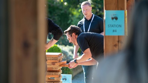 Focused and locked in for giant jenga