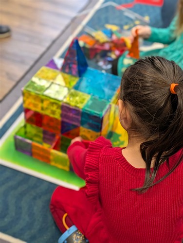 Creative play and building activities help students develop problem-solving skills at Quantum STEM School.