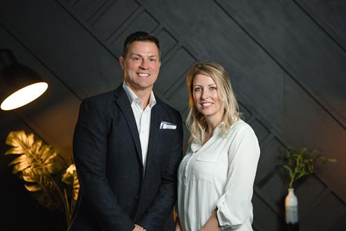 Brett Kobes with a happy client, Kerri Dizon.