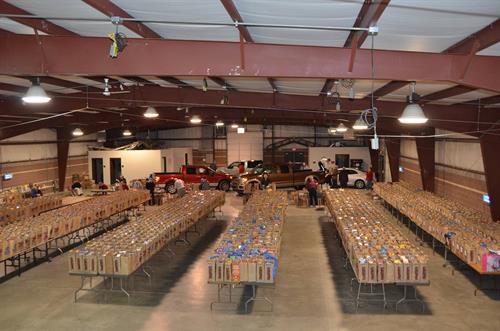 CCHASM Thanksgiving Meal Program preparing for disbursement at the County Fairgrounds.