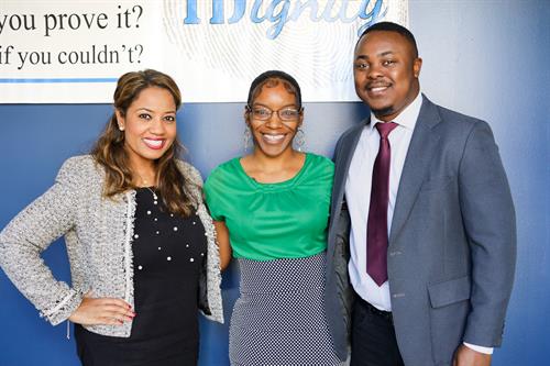 IDignity's two attonery's smile with client Kiara after a succesful name change.She can now obtian a Florida ID. 
