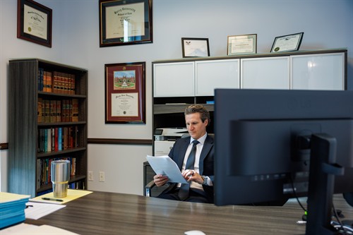 Attorney Brandon Gans working 