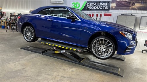 Mercedes E53 AMG multi-stage paint correction, 6-year warranty ceramic coating, soft top protection, wheels and calipers coated, and exterior glass ceramic coating.