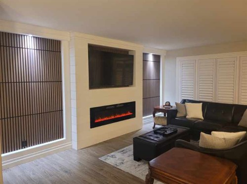 Feature wall with built-in fireplace and TV
