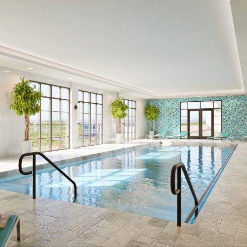 The resort-style pool is designed to offer a relaxing outdoor setting for recreation, wellness, and social connection.