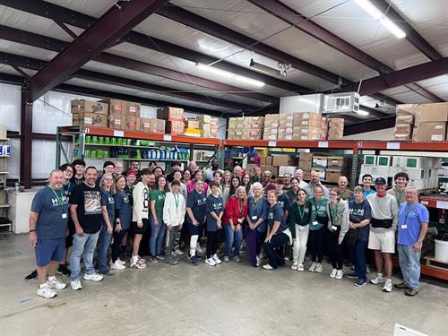 The packing team boxing up 310 Thanksgiving food boxes