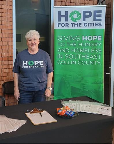 Liz at the Hope for the Cities booth