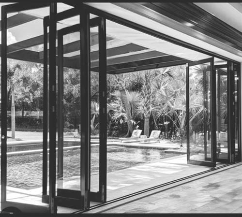 Transform your outdoor space with handcrafted, custom sliding patio doors.