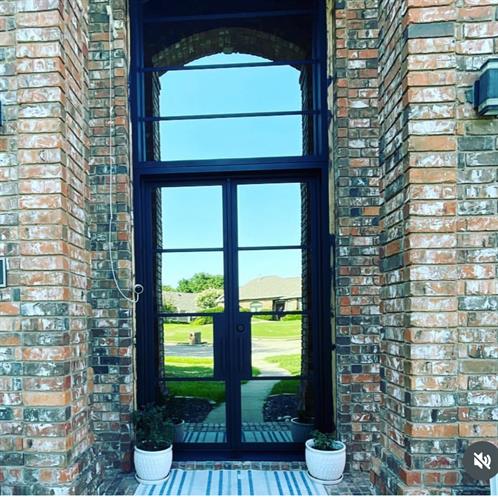 Front iron door w/ mirror and inside glass privacy 