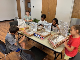 Making some solar ovens for cooking up yummy food. Making some solar ovens for cooking up yummy food.