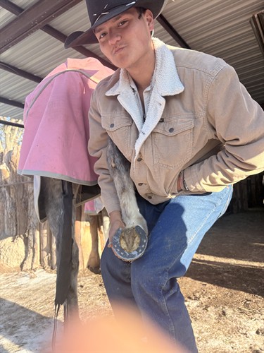 Heriberto after he Shod a HFH mare! 