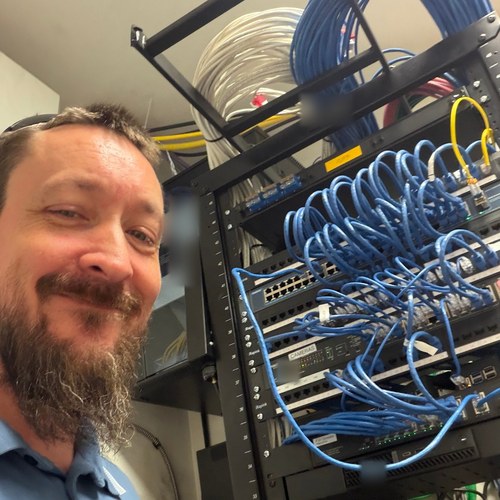 Organized network rack and patch cabling, installed and labeled by SOHO Logics