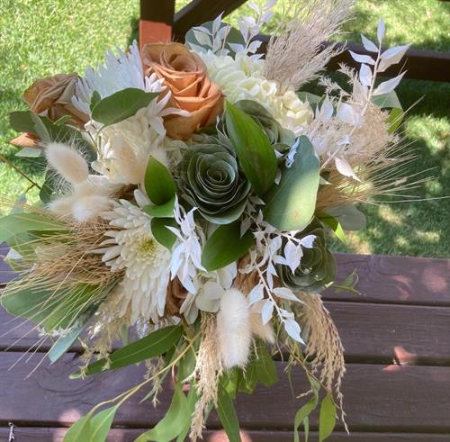 Fall bouquet with pampas, handmade roses using green foliage and assorted blooms.