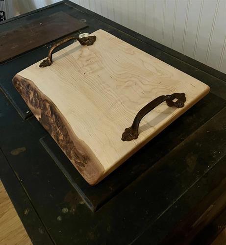 One of our hand crafted, live edge charcuterie boards
