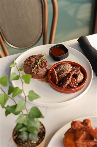 Filet Minon with truffle fingerling potatoes and our housemade demi glace