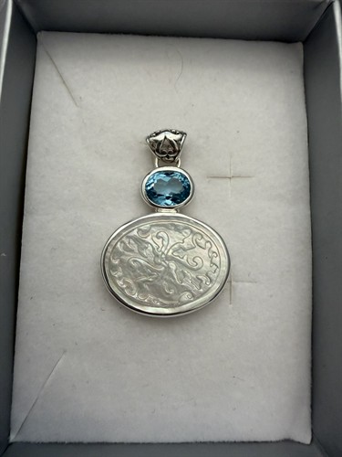 blue topaz and carved Mother of Pearl pendant by Janice Girardi