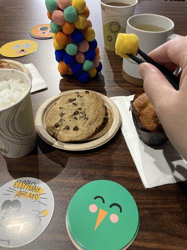 What better pairing than cookies, cocoa, and a game of Fuzzies?