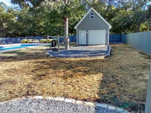 Ground Raising with Fill Dirt, Seeding & Wheat Ground Covering Along with Slate Chip Parking Pad & Cobble Stone Edging - Kathleen, Ga