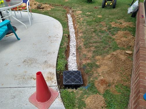 French Drain with Low Spot Drain, Perforated Corrugated Piping with Sleeve & Marble Chips for Drainage (*Not Pictured - Slate Chips Hardscape on Top for Drainage) - Bonaire, Ga