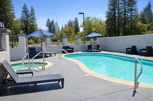 Gallery Image retouched_Sunny_resort_pool_and_lounge_area.jpg