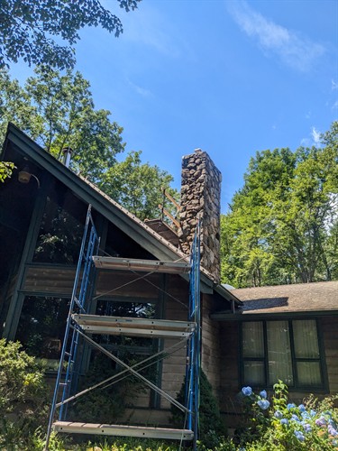 Gaining access to the exterior of a chimney