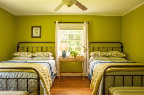 The second bedroom has a pillow top queen and pillow top full bed with cheerful bedding.