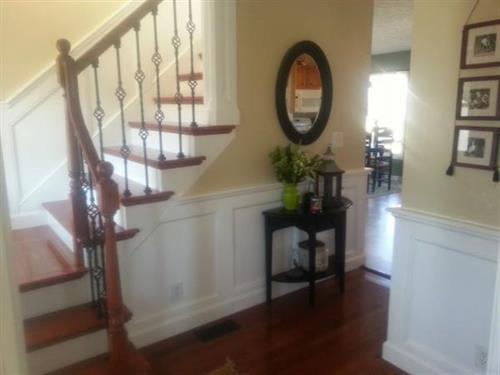 Entryway remodel, custom trim, hardwood flooring, stairway replacement