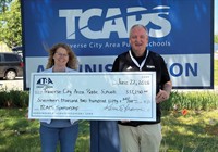 TBA Credit Union Deepens Community Commitment with TCAPS Contribution